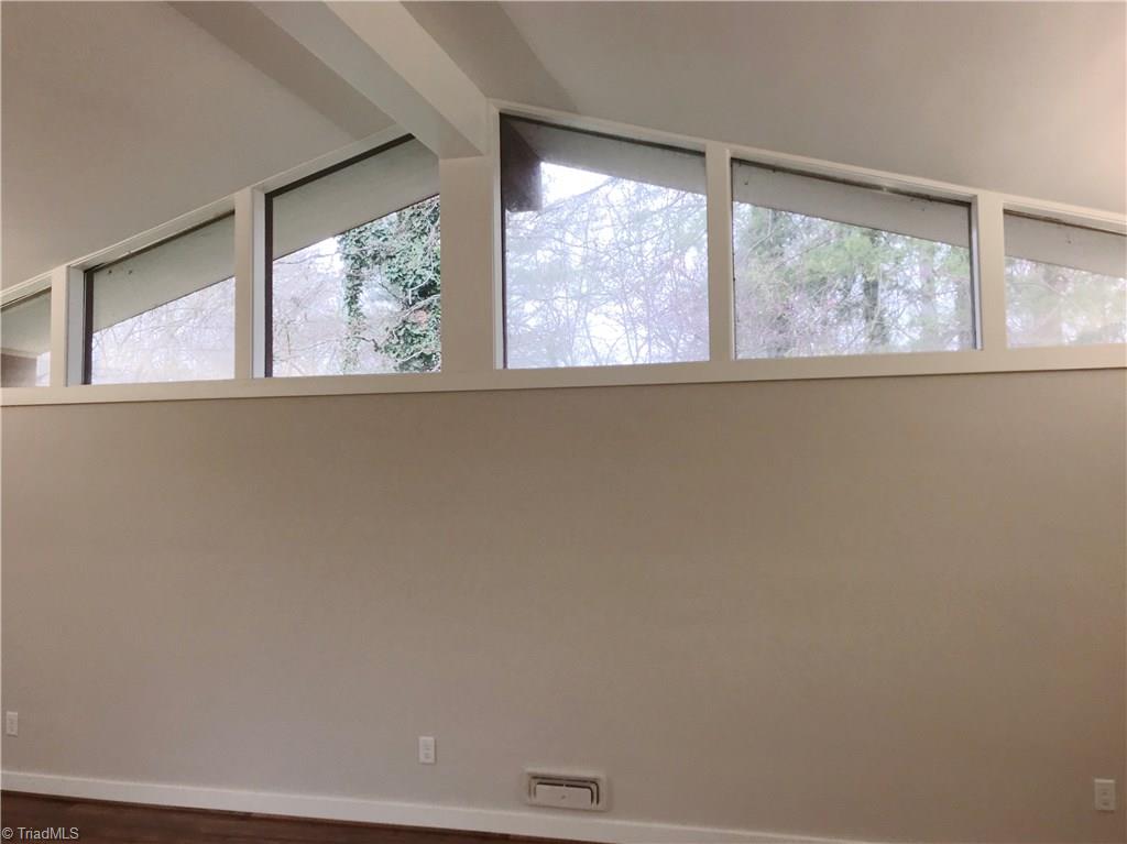 177 Ruffin Street Cooleemee, NC 27014 - Photo 4 of 21 Vaulted Ceiling & Transom Windows in Living Area