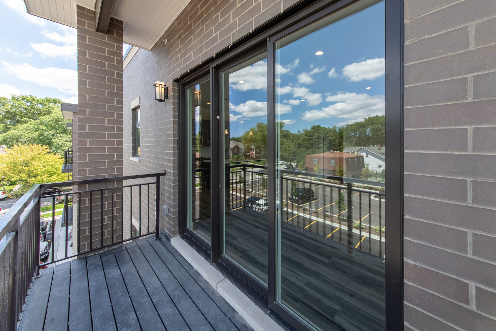 1116 Courtland Avenue, Unit 304 Park Ridge, IL 60068 - Photo 19 of 19 a view of a balcony with floor to ceiling window wooden floor with wooden floor