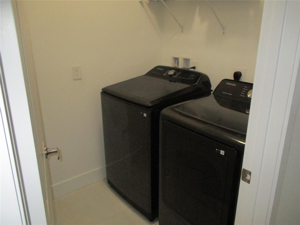 Undisclosed Address Homestead, FL 33030 - Photo 8 of 19 a utility room with dryer and washer