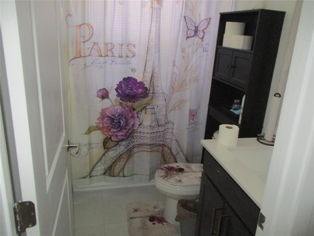 Undisclosed Address Homestead, FL 33030 - Photo 10 of 19 a bathroom with a sink toilet and shower