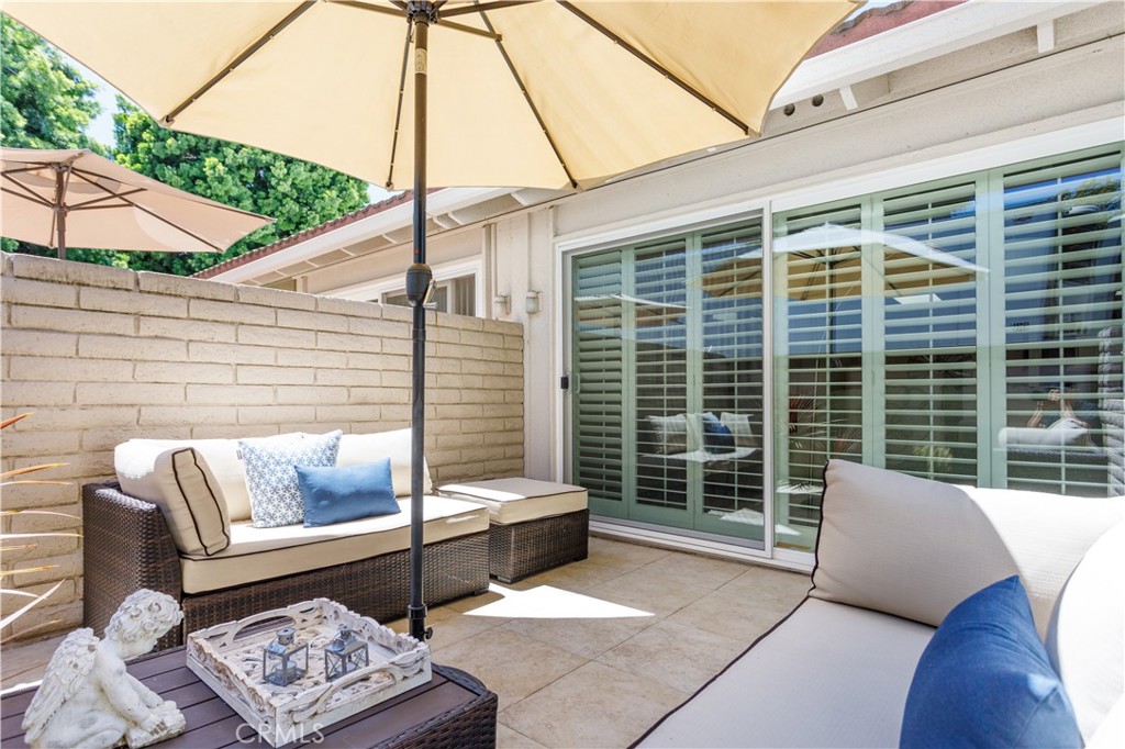 3103 Via Serena North, Unit A Laguna Woods, CA 92637 - Photo 14 of 17 a view of a patio with couches and city view