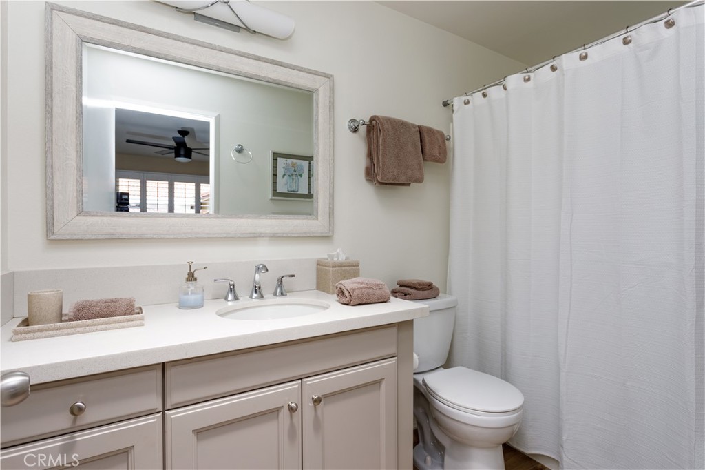 3103 Via Serena North, Unit A Laguna Woods, CA 92637 - Photo 8 of 17 a bathroom with a sink and a mirror