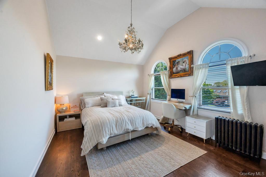 357 Wynsum Avenue Merrick, NY 11566 - Photo 26 of 40 a bedroom with a bed and a window