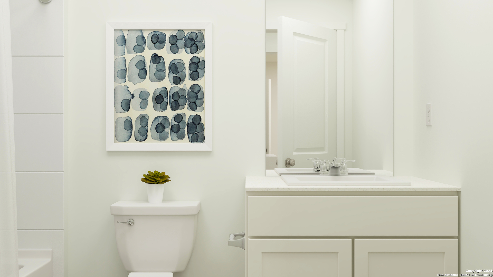 229 Inyo Street New Braunfels, TX 78130 - Photo 25 of 31 a bathroom with a sink mirror and toilet