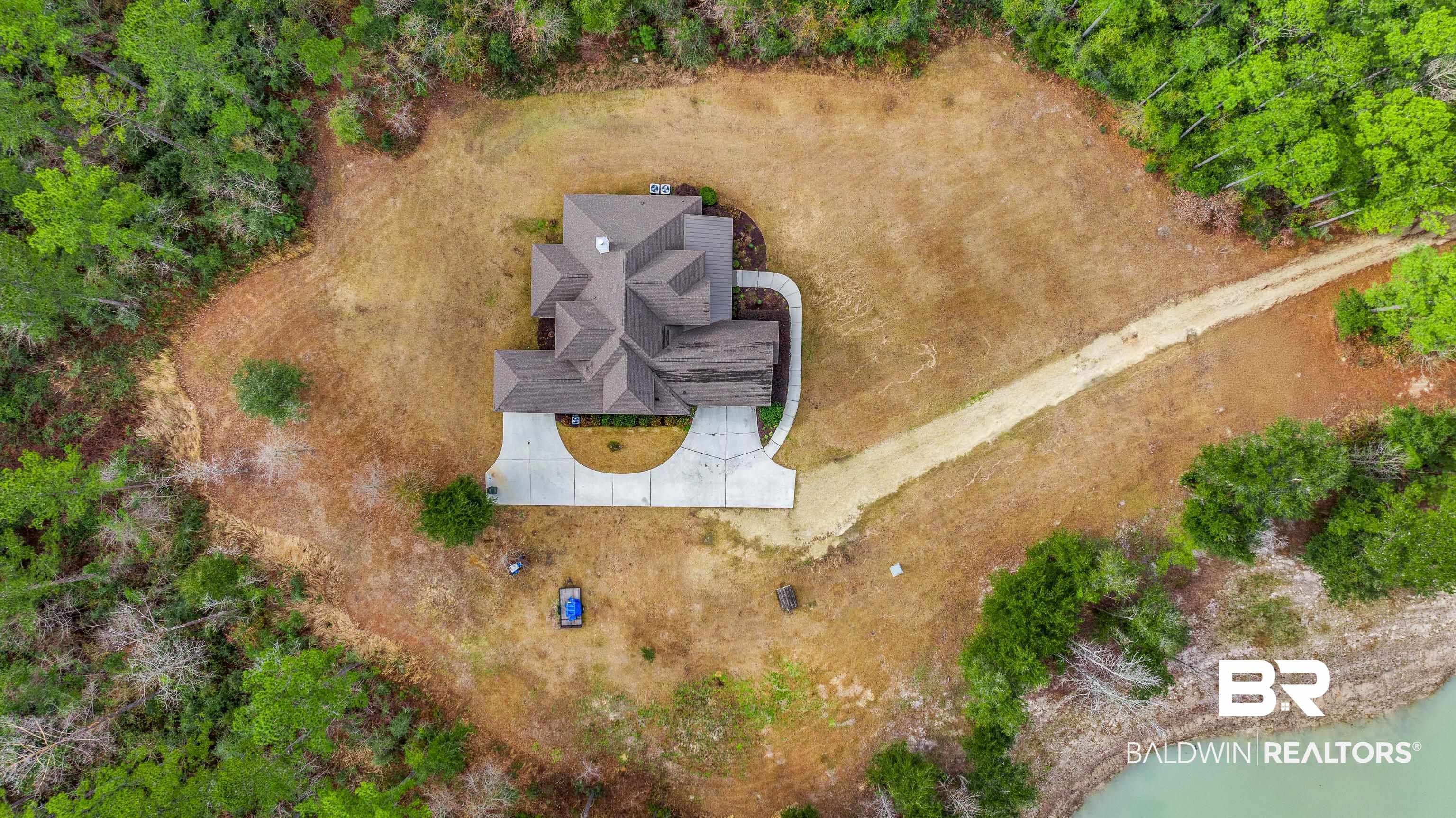 36784 Legacy Way Bay Minette, AL 36507 - Photo 51 of 57 Drone / aerial view with pond