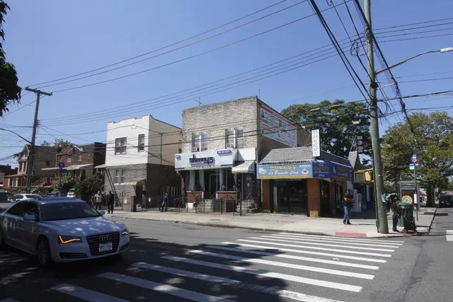 a front view of a building with street