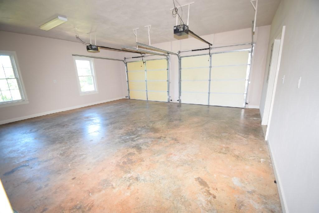 4027 Goodview Town Road Moneta, VA 24121 - Photo 18 of 21 an empty room with wooden floor and windows