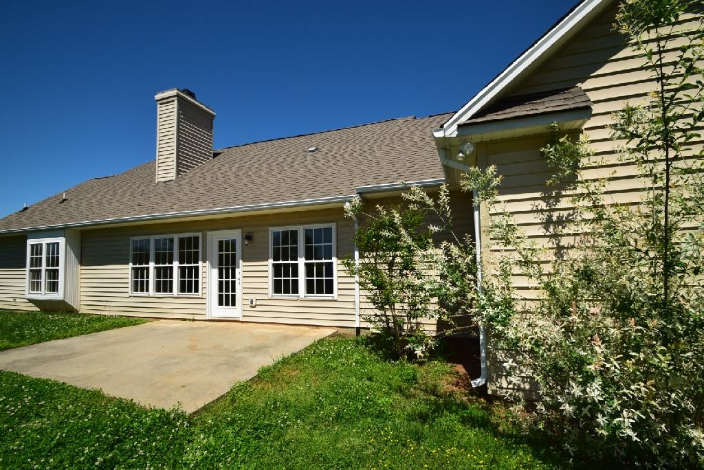 4027 Goodview Town Road Moneta, VA 24121 - Photo 20 of 21 a front view of a house with garden