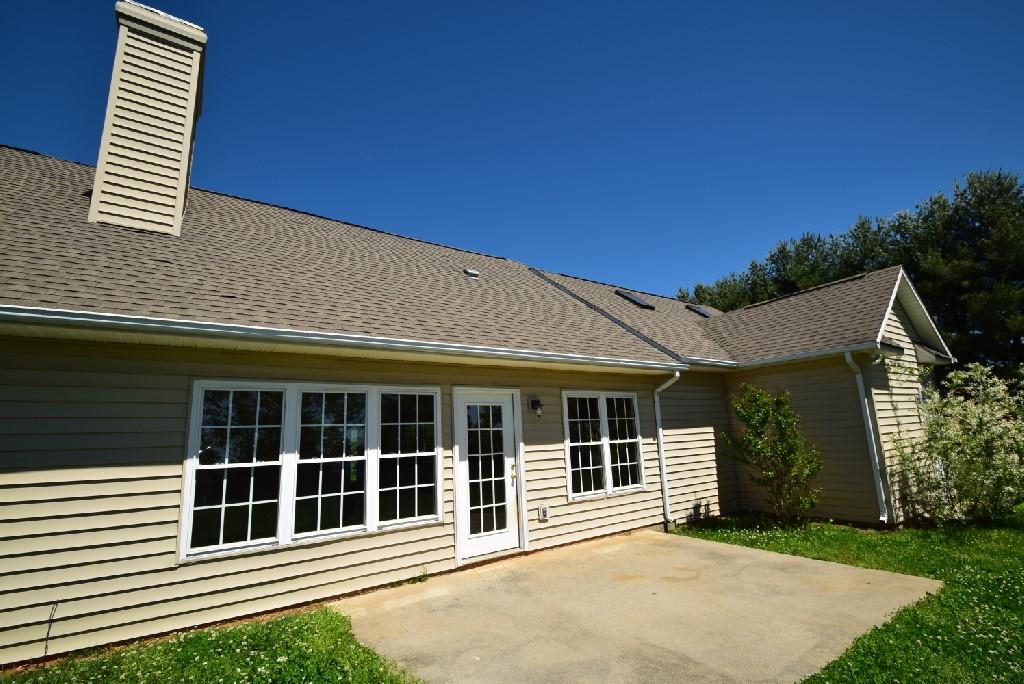 4027 Goodview Town Road Moneta, VA 24121 - Photo 21 of 21 a front view of a house with a yard