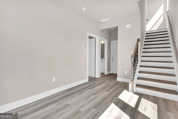 a view of wooden floor in an empty room