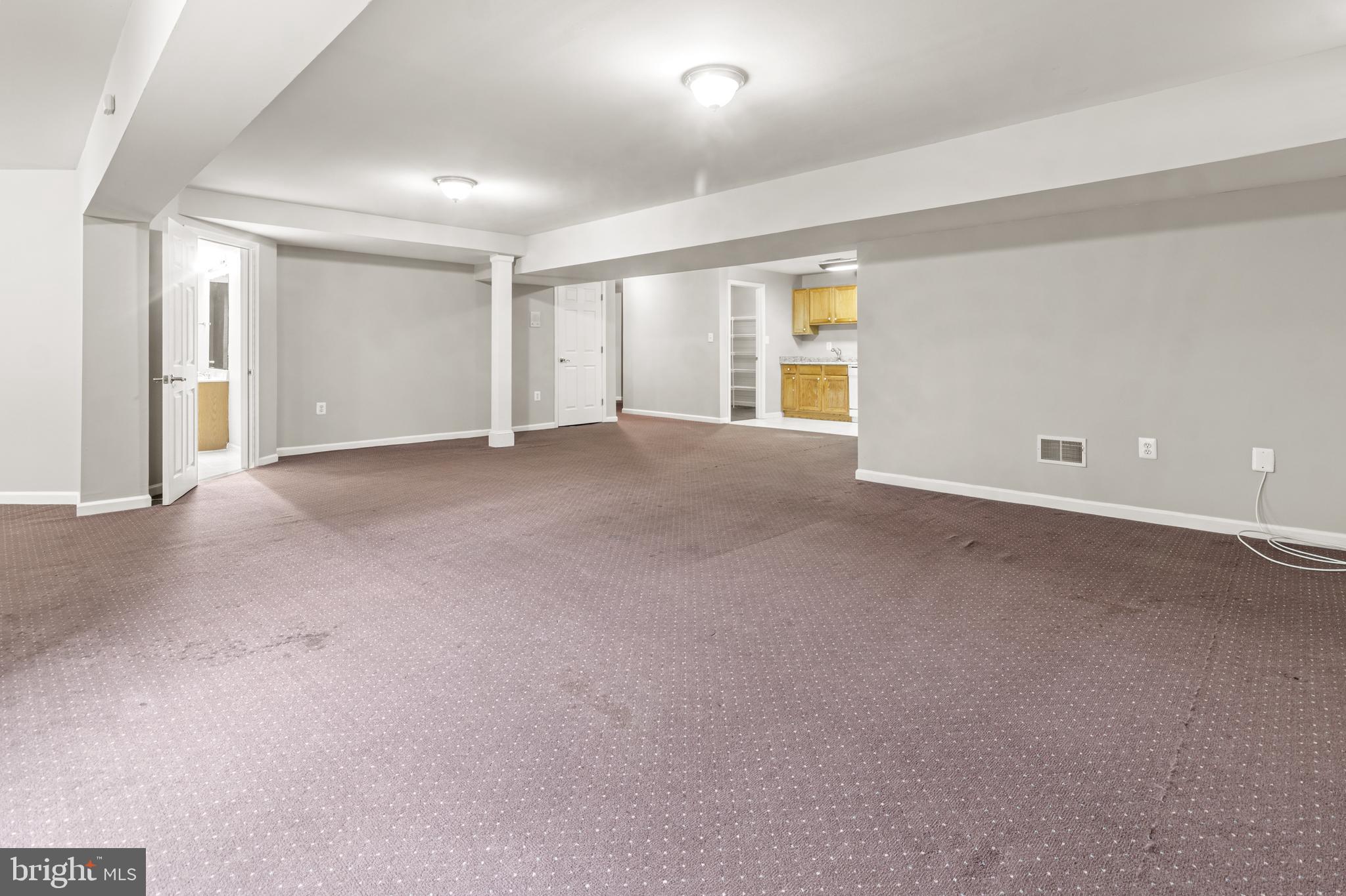 13937 Alderton Road Silver Spring, MD 20906 - Photo 54 of 65 a view of an empty room with a window