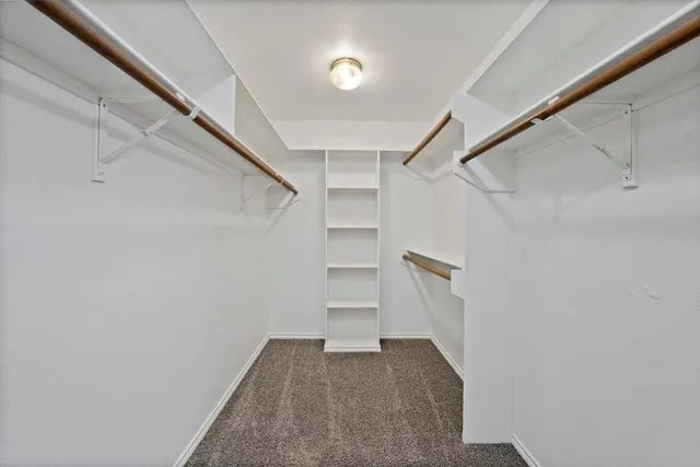 a view of an empty walk in closet