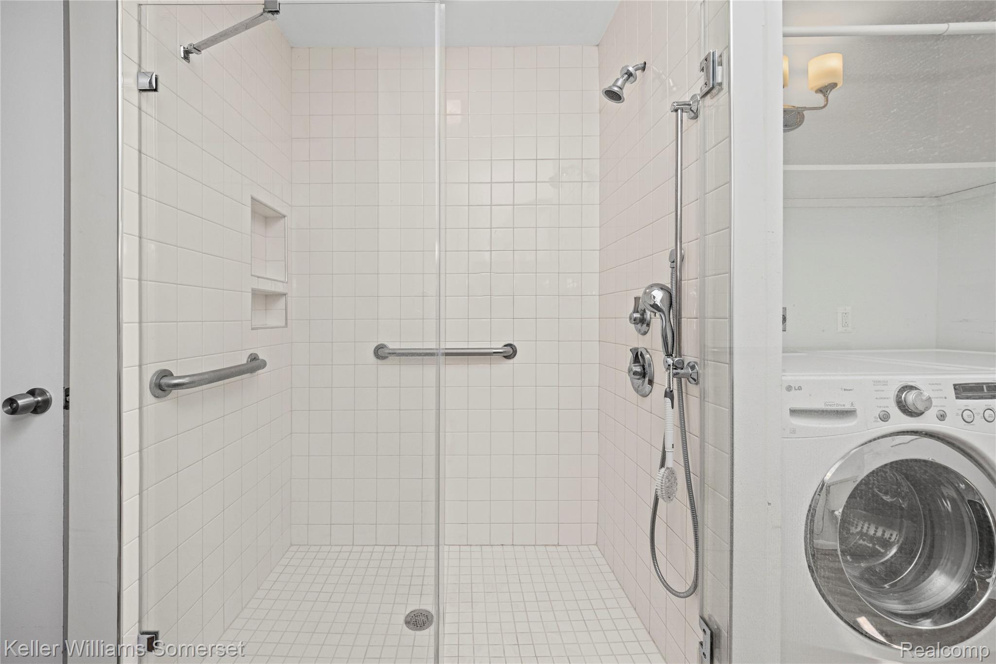 2344 Rochester Road Leonard, MI 48367 - Photo 33 of 66 Walk-in shower with clear glass enclosure and white tile