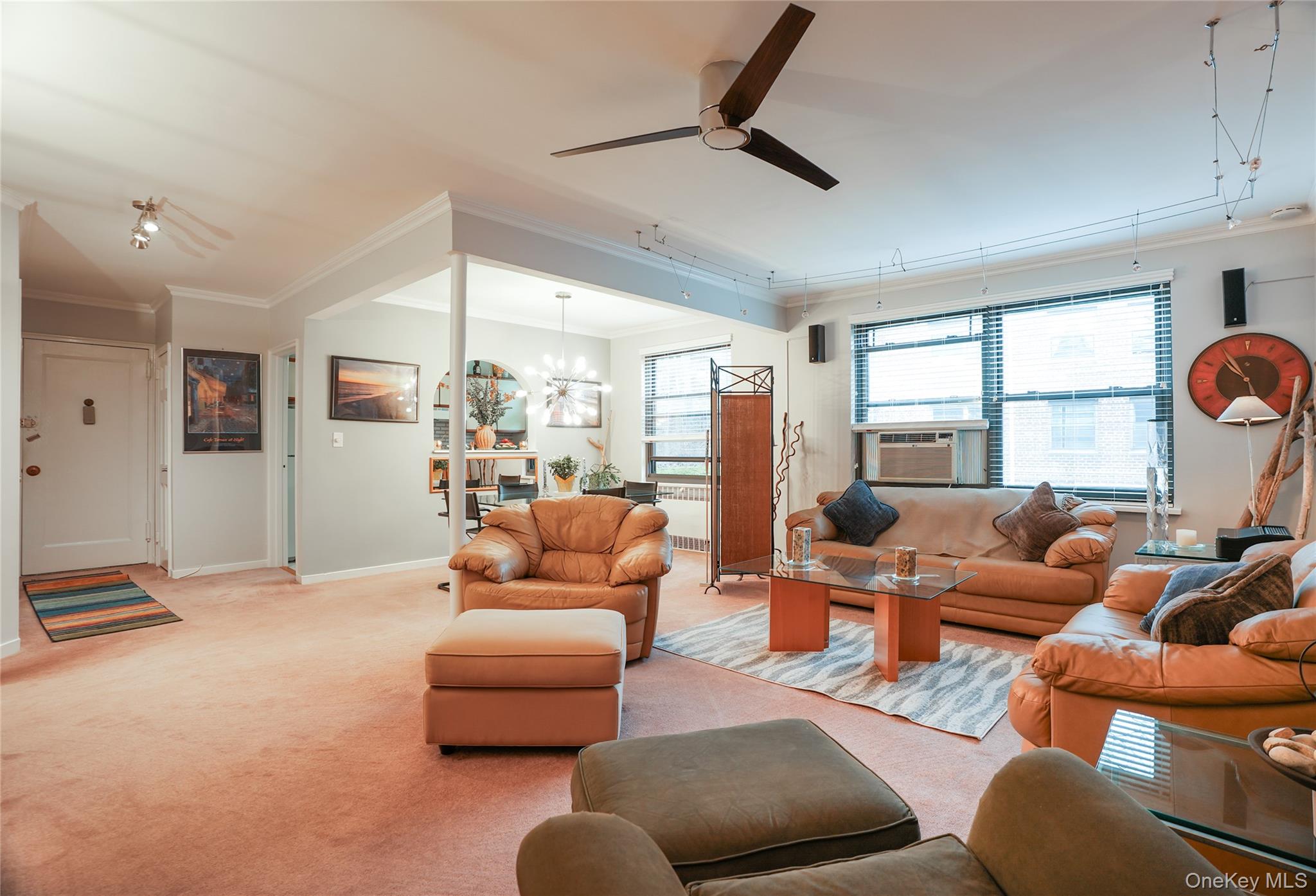 35 Rockledge Road, Unit 2A Hartsdale, NY 10530 - Photo 1 of 20 a living room with furniture and a large window