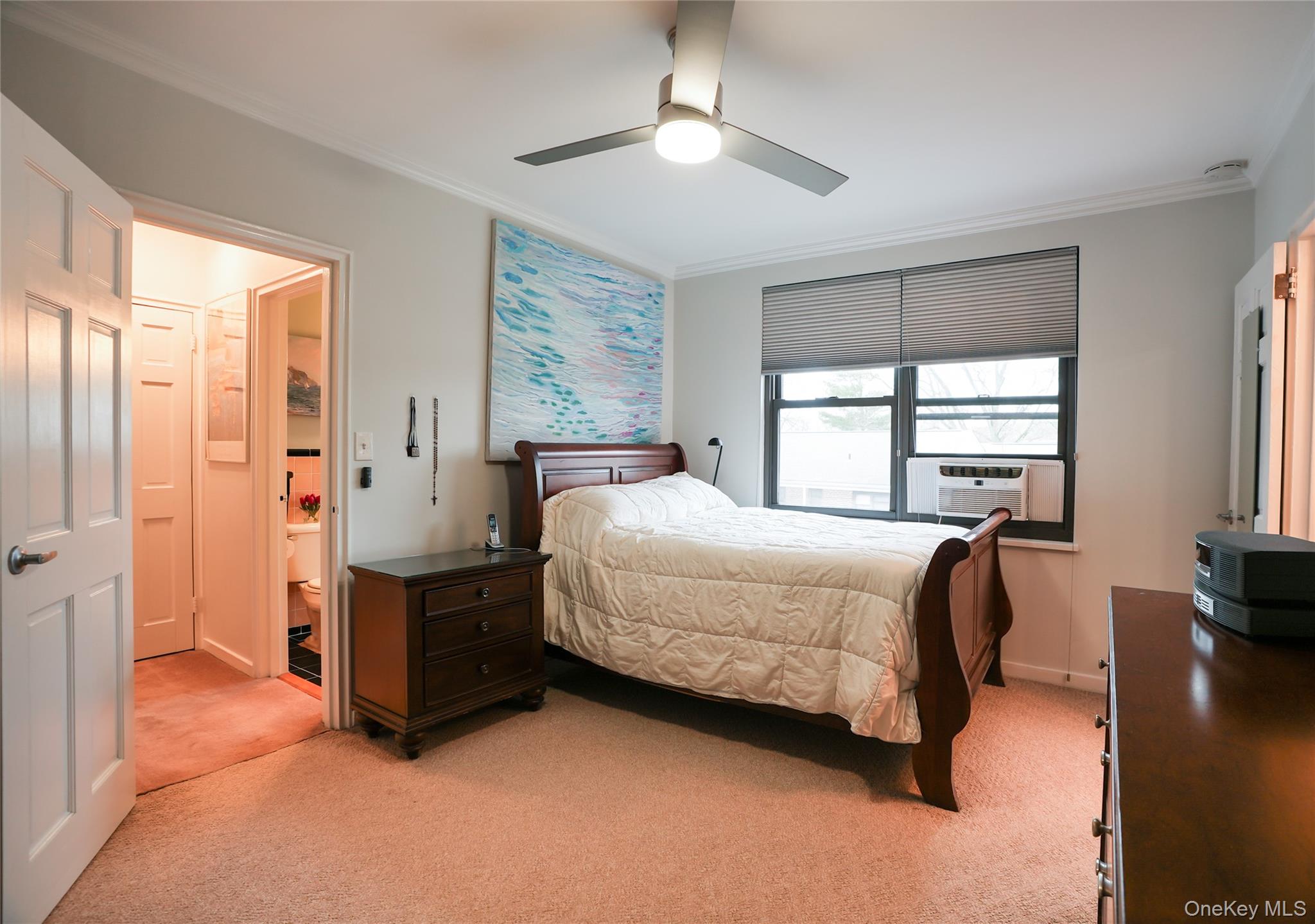 35 Rockledge Road, Unit 2A Hartsdale, NY 10530 - Photo 11 of 20 a bed room with a bed and a window