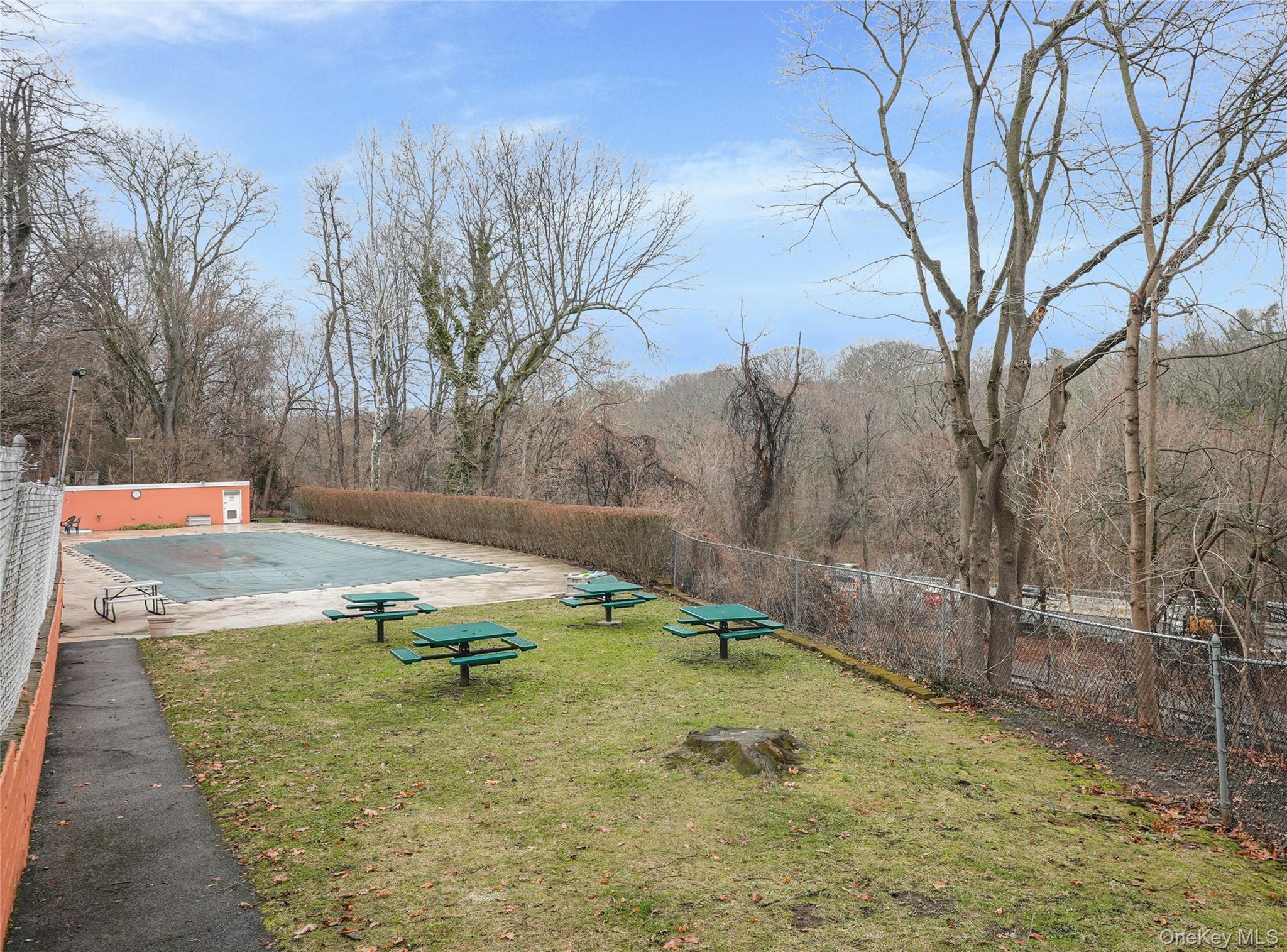 35 Rockledge Road, Unit 2A Hartsdale, NY 10530 - Photo 19 of 20 a view of a backyard with large trees
