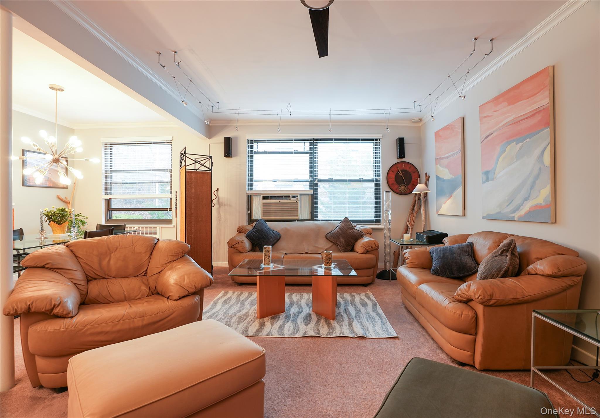 35 Rockledge Road, Unit 2A Hartsdale, NY 10530 - Photo 2 of 20 a living room with furniture and a large window
