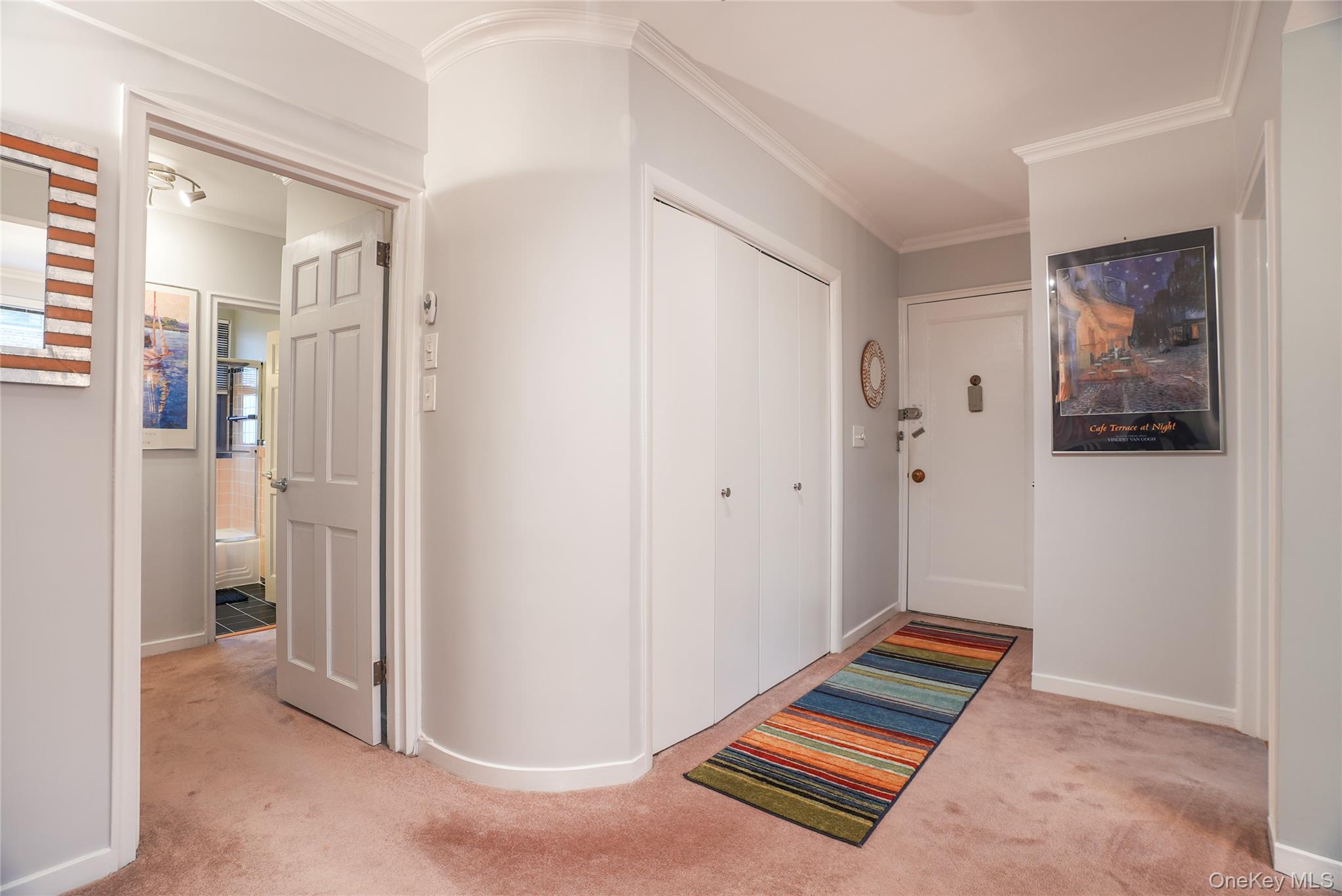35 Rockledge Road, Unit 2A Hartsdale, NY 10530 - Photo 8 of 20 a living room with a dresser and a window