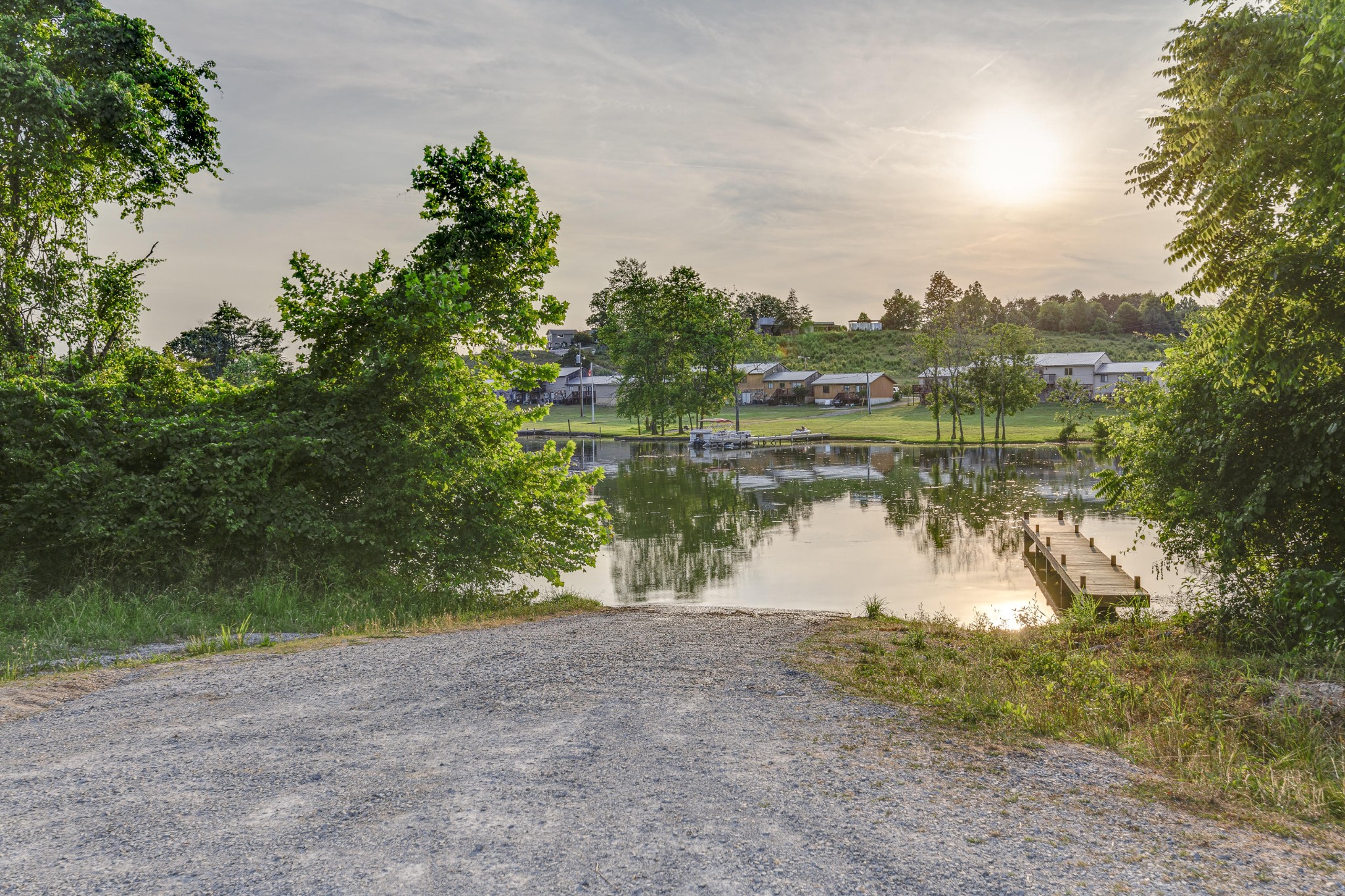 1441 Paint Rock Ferry Road Kingston, TN 37763 - Photo 12 of 13 a view of a lake with houses in the back