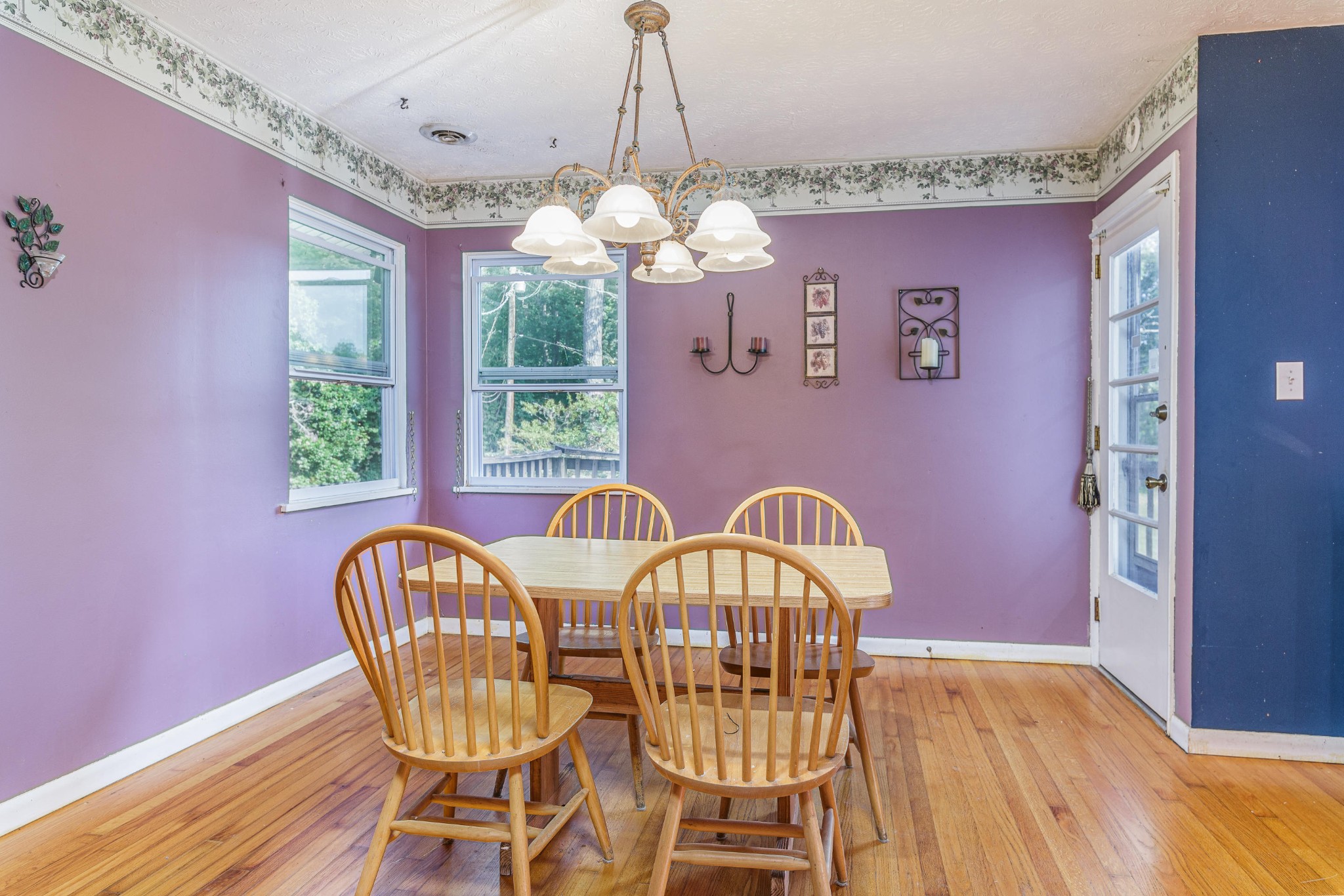 1441 Paint Rock Ferry Road Kingston, TN 37763 - Photo 6 of 13 a view of a dining room with furniture window and wooden floor