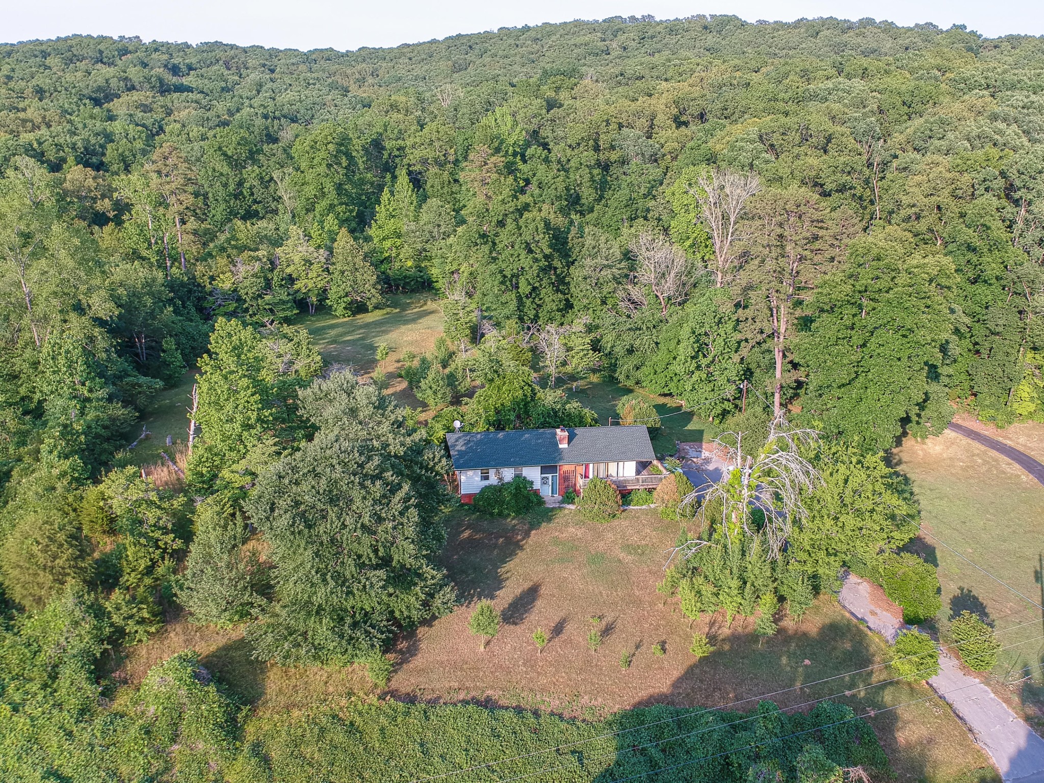 1441 Paint Rock Ferry Road Kingston, TN 37763 - Photo 9 of 13 an aerial view of a house with a yard