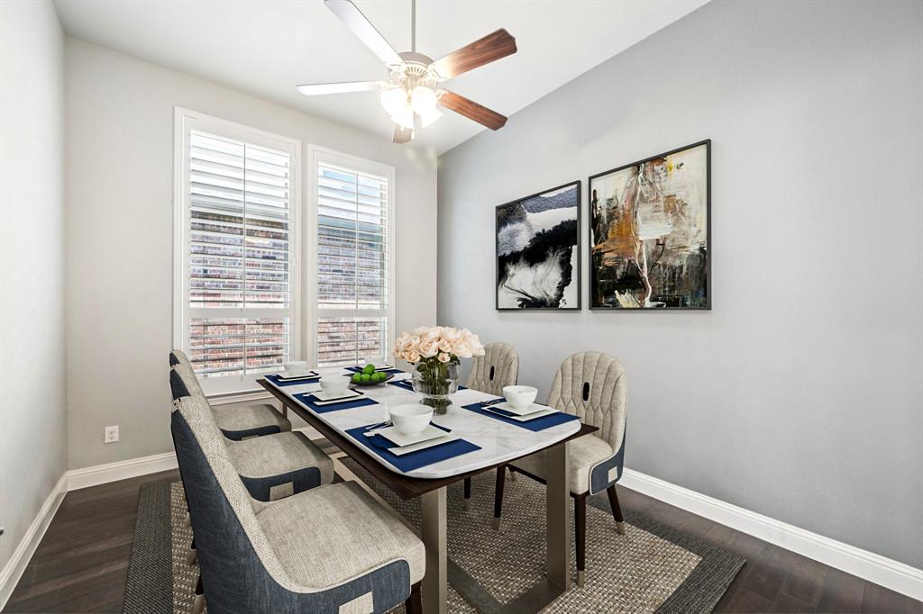 3415 Secretariat Place Celina, TX 75009 - Photo 12 of 40 a view of a dining room with furniture window and wooden floor