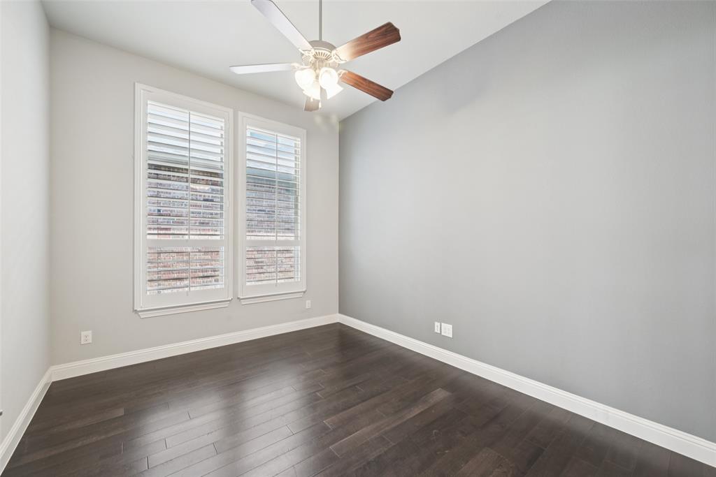 3415 Secretariat Place Celina, TX 75009 - Photo 37 of 40 an empty room with wooden floor and windows