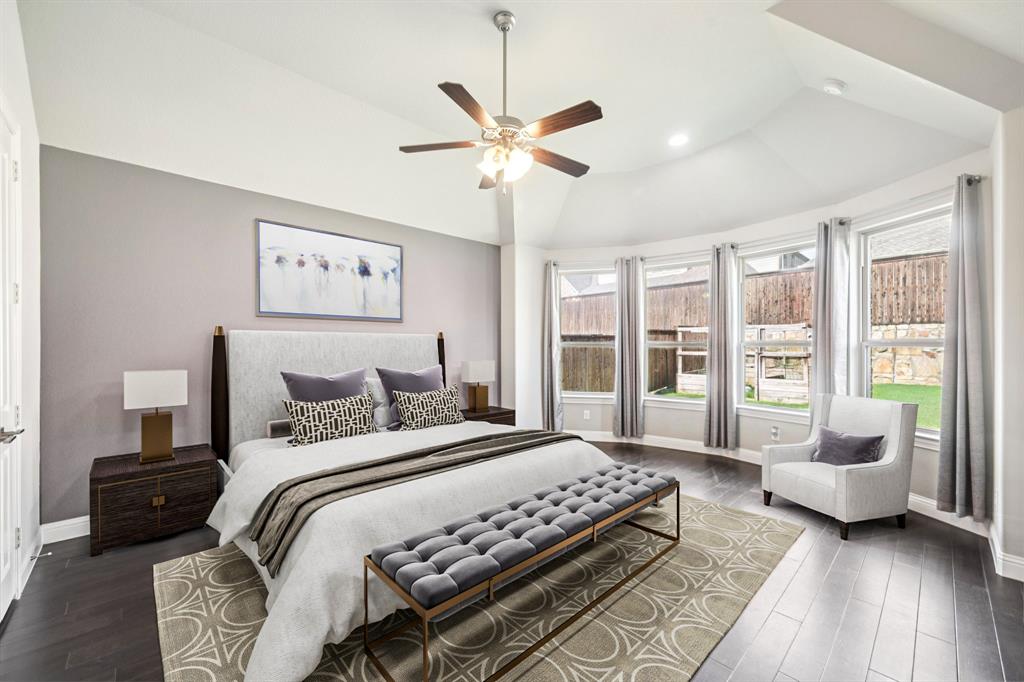 3415 Secretariat Place Celina, TX 75009 - Photo 4 of 40 a bedroom with a bed couch and a large window