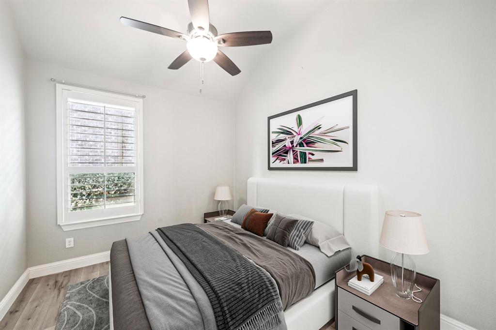 3415 Secretariat Place Celina, TX 75009 - Photo 10 of 40 a bedroom with a bed and a painting on the wall