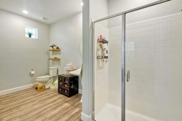 a bed room with a bed and a window