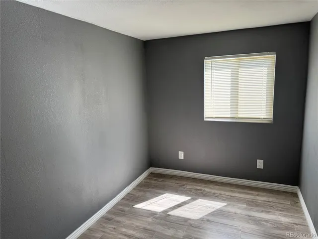 a view of a window in an empty room