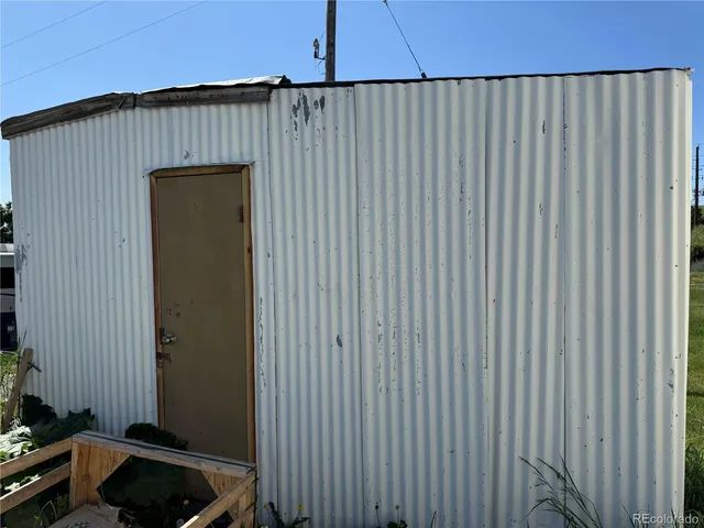 a house view with a backyard space