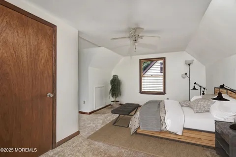 a room with gym equipment and windows