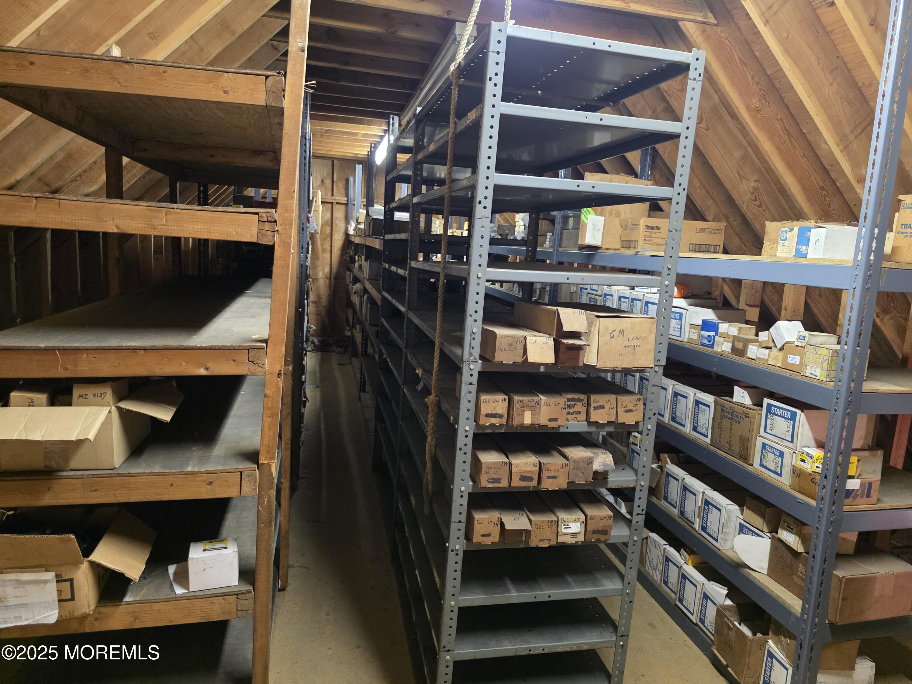 370 Cassville Road Jackson, NJ 08527 - Photo 4 of 18 a view of walk in closet with clothes and shoes