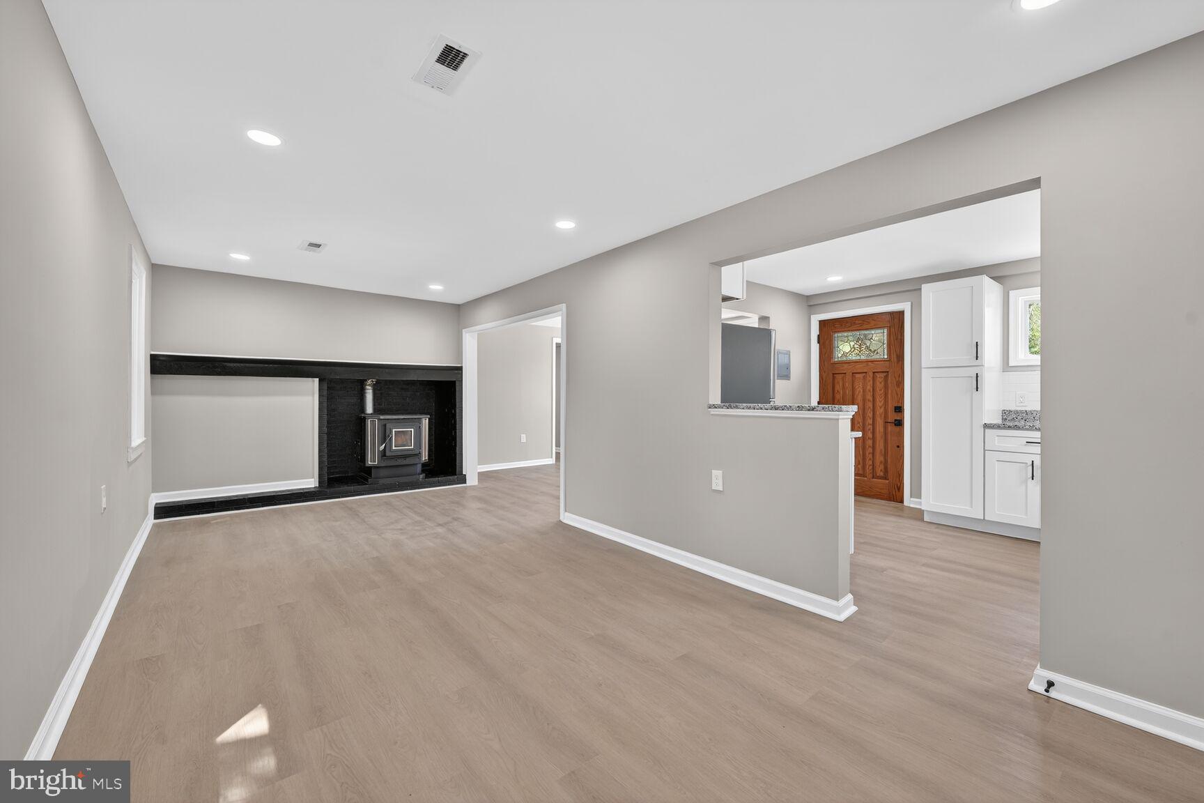 9329 Allentown Road Fort Washington, MD 20744 - Photo 6 of 14 Living room with a fireplace