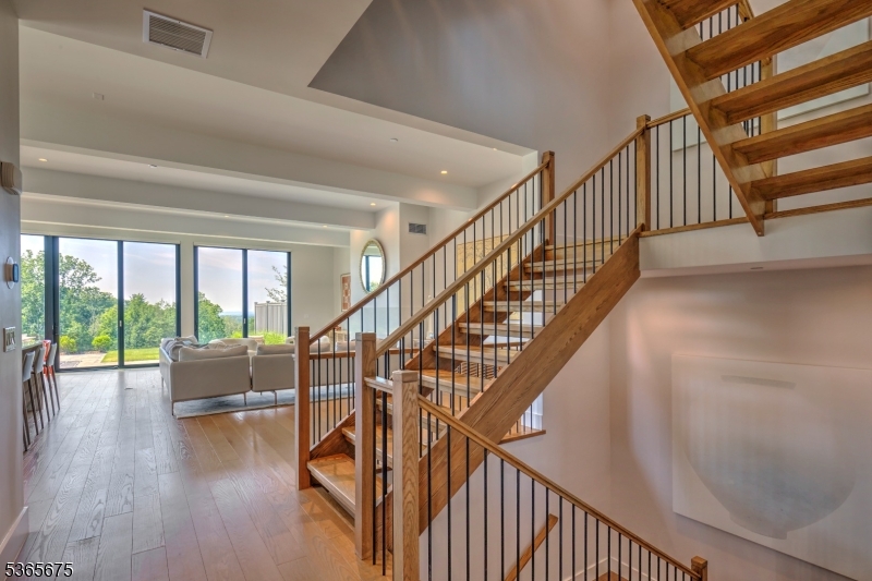 51 Abby Road Peapack, NJ 07977 - Photo 13 of 31 a view of entryway and hall with wooden floor