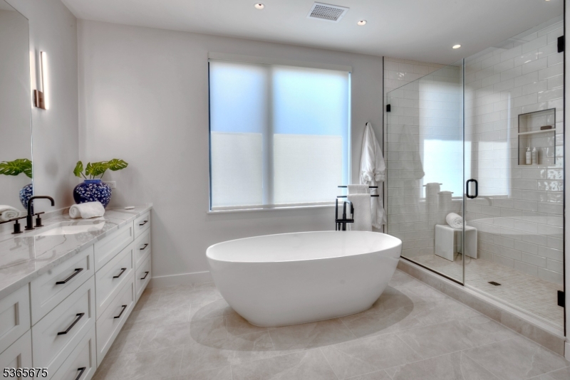 51 Abby Road Peapack, NJ 07977 - Photo 19 of 31 a spacious bathroom with a double vanity sink mirror and double