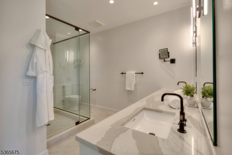 51 Abby Road Peapack, NJ 07977 - Photo 21 of 31 a bathroom with a sink and a shower