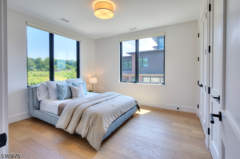 51 Abby Road Peapack, NJ 07977 - Photo 23 of 31 a bedroom with a bed and window