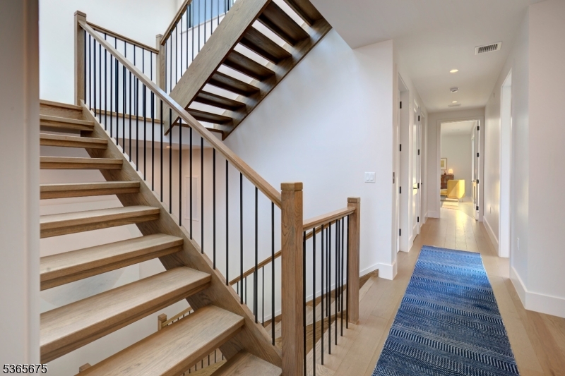 51 Abby Road Peapack, NJ 07977 - Photo 24 of 31 a view of a hallway with wooden floor and entryway