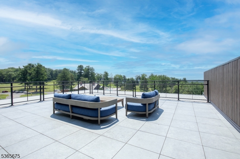 51 Abby Road Peapack, NJ 07977 - Photo 27 of 31 a outdoor space with the couches and night stand