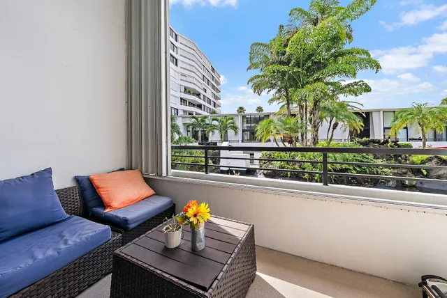 a outdoor living space with furniture and a potted plant