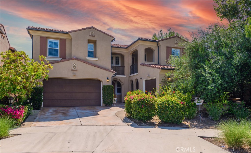 Undisclosed Address Irvine, CA 92618 - Photo 1 of 1 a front view of a house with a garden