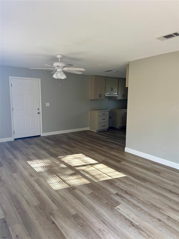 301 Fairview Street Pittsburg, TX 75686 - Photo 2 of 13 a view of a livingroom with wooden floor