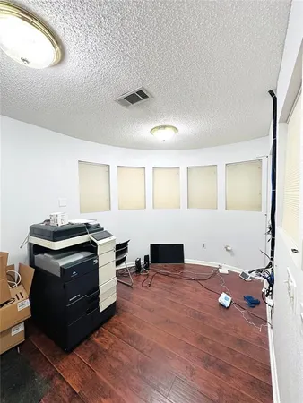 a view of a livingroom with furniture