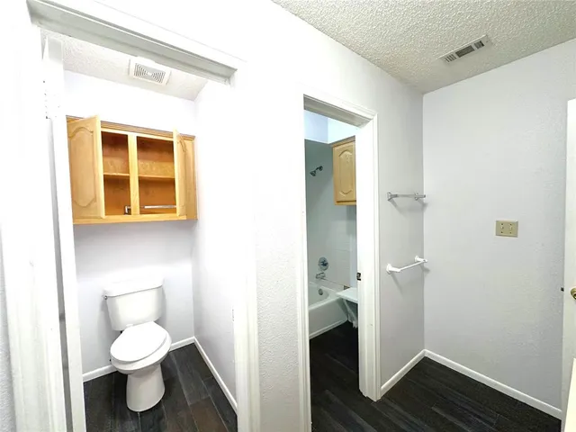 a bathroom with a toilet