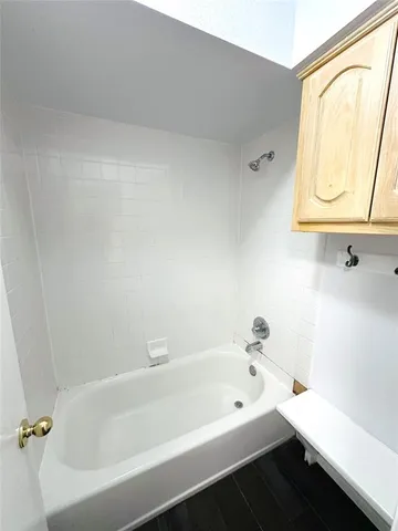 a bathroom with a bathtub