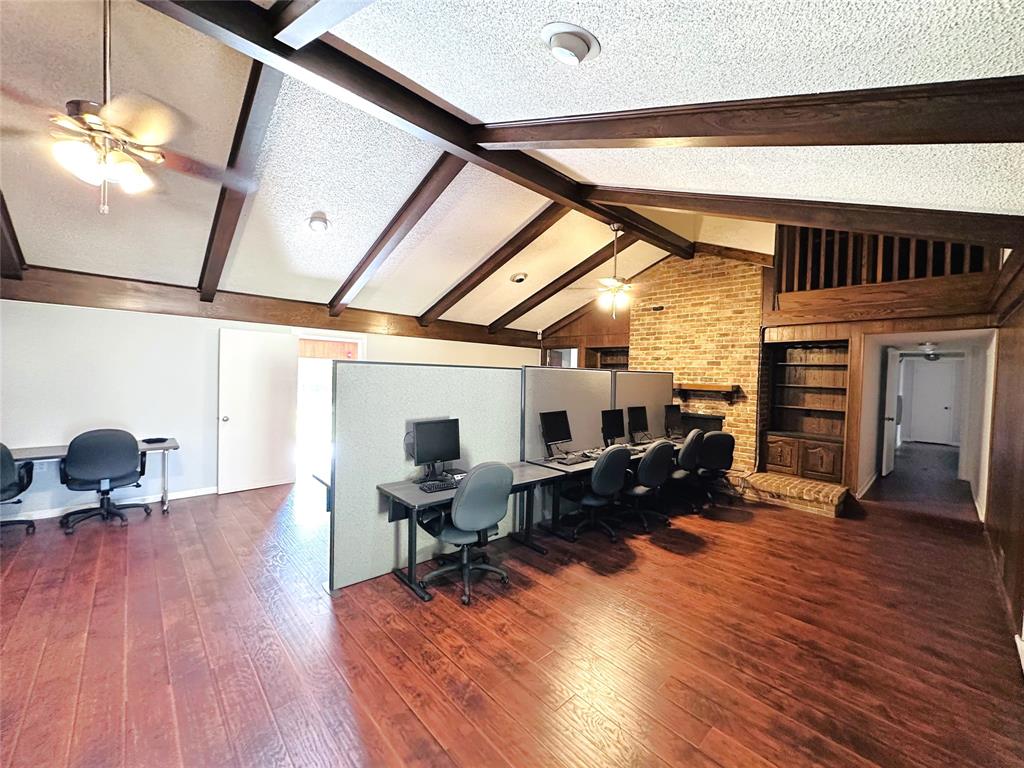 722 East Wheatland Road Duncanville, TX 75137 - Photo 9 of 40 a living room with furniture and wooden floor