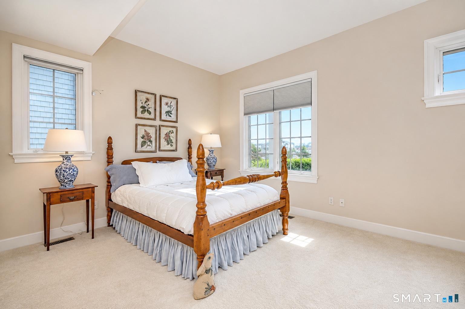 1681 Fairfield Beach Road Fairfield, CT 06824 - Photo 26 of 36 First-floor guest suite with natural light and views toward South Pine Creek across the street.