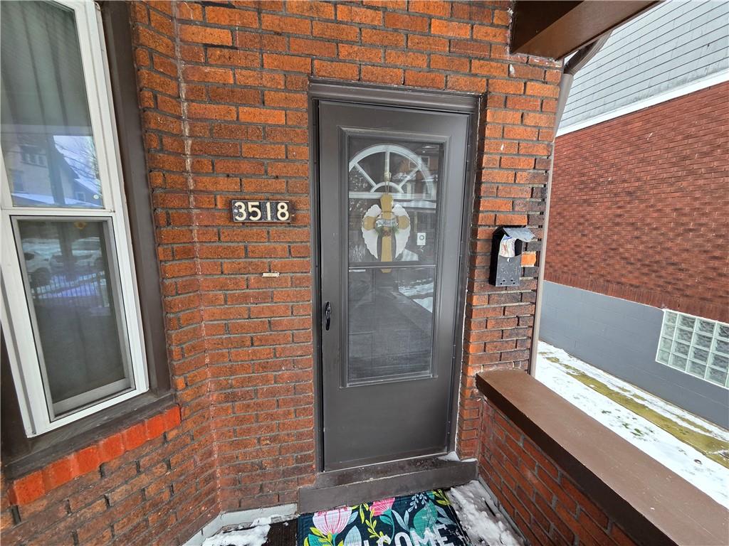 3520 Campus Street Pittsburgh, PA 15212 - Photo 15 of 26 a front view of a house with a door